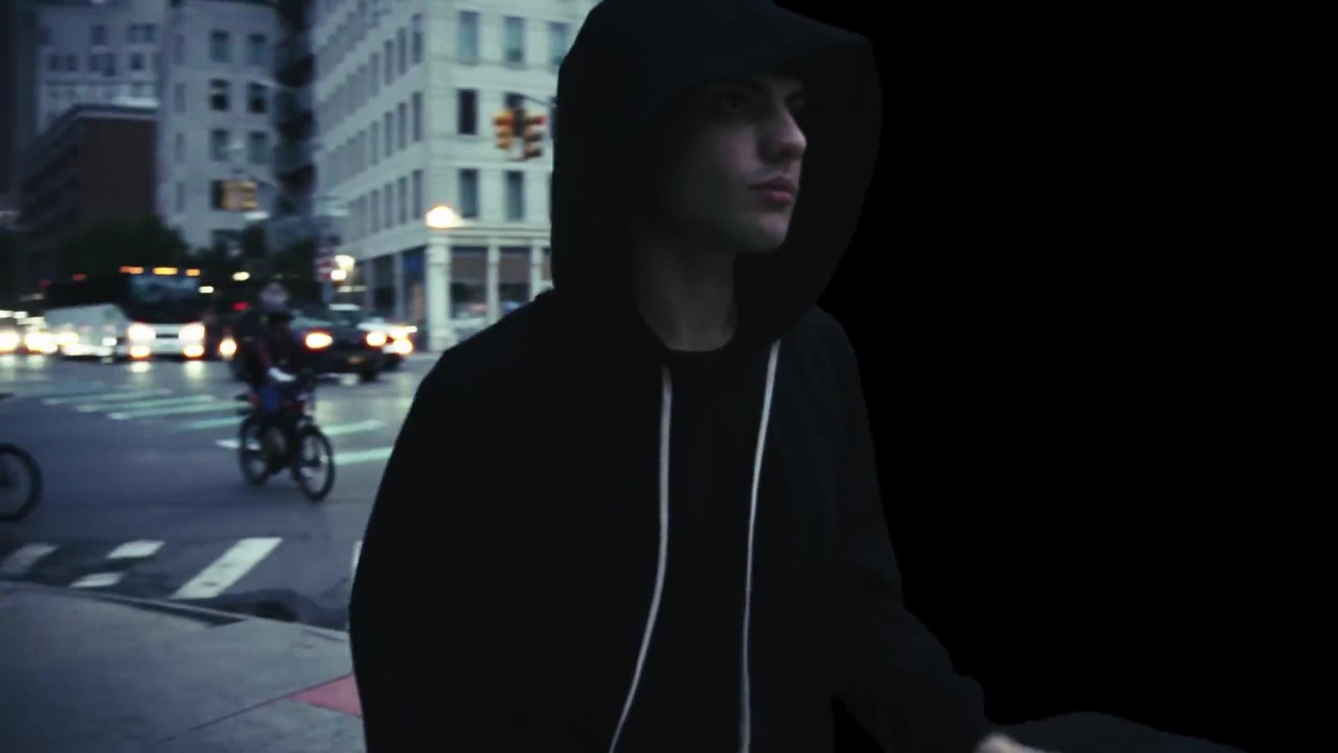 Fixupboy crouched in black, FEAR OF MISSING OUT era.